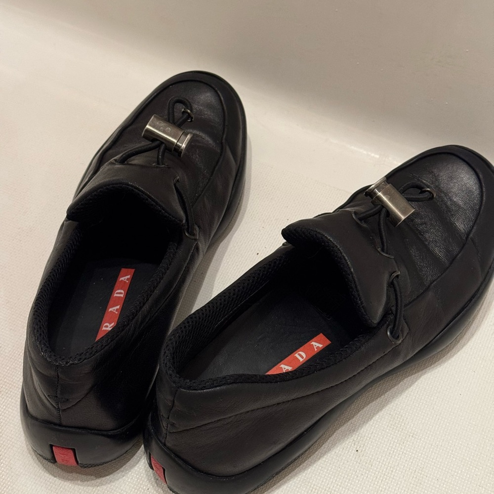 Prada Black Leather Slip-On Loafers with Silver Hardware